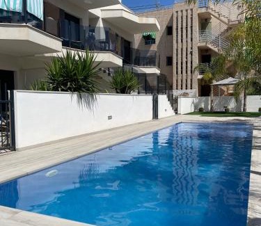 Santiago de la Ribera Apartment | Air-conditioned Elisa Apartment with spacious sunroof lounge and swimming pool