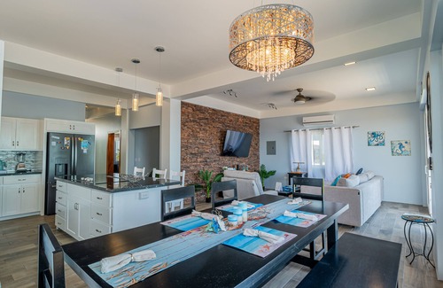 Boca Ciega Apartment | Amazing 2 story oceanfront house with pool, balcony, central AC, & W/D