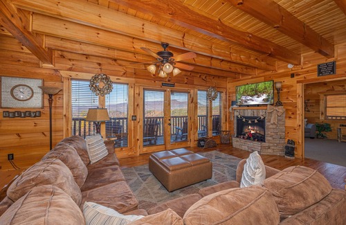 Pigeon Forge Cabin | Amazing View! 7 Bedrooms, Hot Tub, Arcade Games.