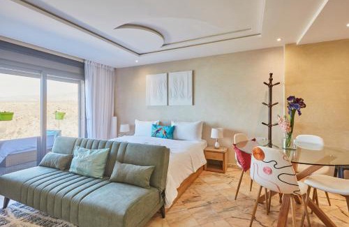 Mirleft Apartment | Amwaj Apt - Surf and Fun Beachfront Stay With Balcony