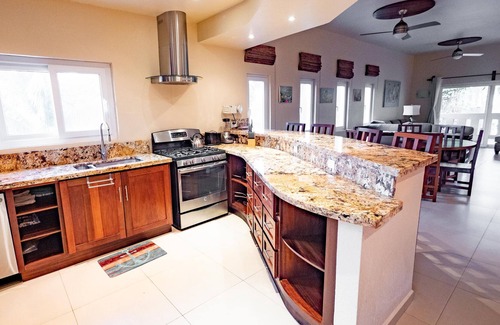 Antoneys Cay Condo | An Oasis in West End: Waterfront with Pool and Dock