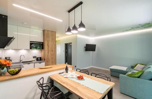 Ustka Apartment | Apartamenty w sam las by KLIF Ustka - apartament na parterze z tarasem i parkingiem