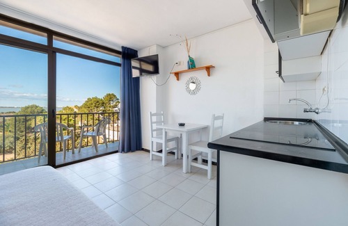 Es Pujols Apartment | Apartment 'Estudio Mirada 307' with Lake View, Wi-Fi and Air Conditioning