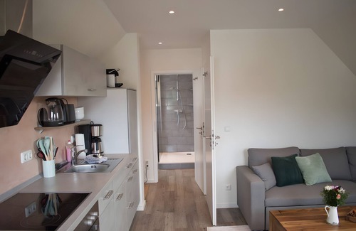Kalkhorst Apartment | Apartment 'Haus Kirchenblick' with Private Terrace, Shared Garden and Wi-Fi