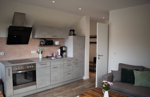 Kalkhorst Apartment | Apartment 'Haus Kirchenblick' with Private Terrace, Shared Garden and Wi-Fi