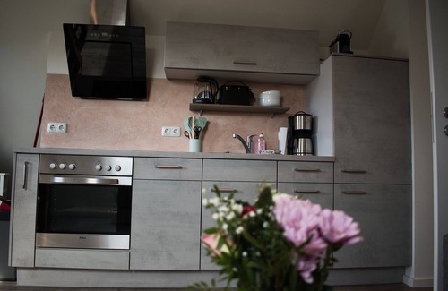 Kalkhorst Apartment | Apartment 'Haus Kirchenblick' with Private Terrace, Shared Garden and Wi-Fi
