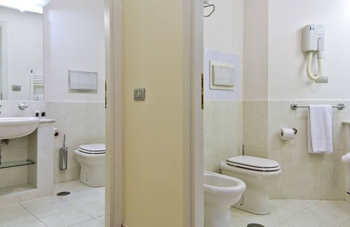 Zona XXX Castel Fusano Apartment | Apartment spacious Long Stay Rome Area I Triangoli with garden in the backyard
