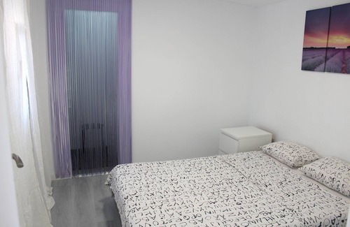 Nou Barris Apartment | Apartment with terrace, barbecue and a beautiful view of the city and the sea.
