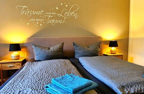 Selk Apartment | Apartments am Selker Noor - mit Naturpark, privater Terrasse und Bachlauf an der Selker Wassermühle
