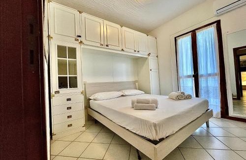 Porto Pozzo Apartment | Appartamento A un passo dal mare