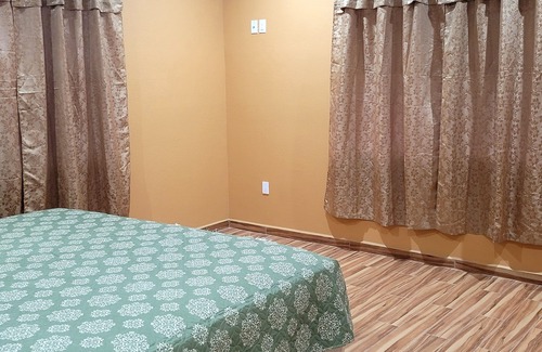 Gibson Bight Villa | Authentic & private 4 bedroom house, in Mangrove bight, West End!