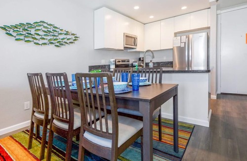 Townsite Condo | B306 - Luxury Penthouse with spacious deck. Enjoy ocean View from Deck lounge sun bed