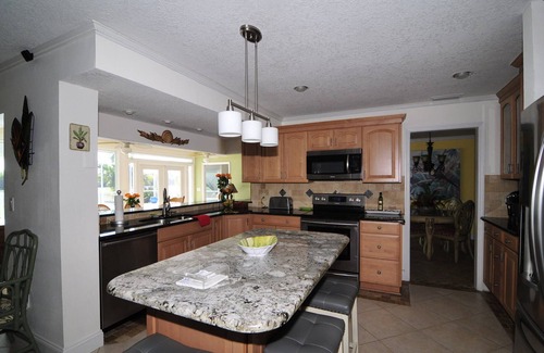 Port Canaveral House | Banana River Beauty-Five bedroom waterfront home with heated pool and spa