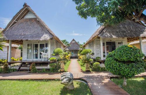 Mushroom Bay Resort | Bay Shore Huts