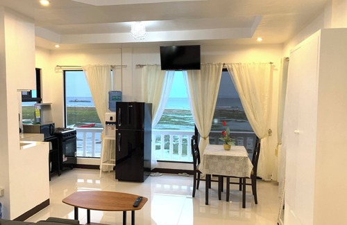 Oslob Apartment | Beach front Studio Unit Pet friendly Big yard and cottage