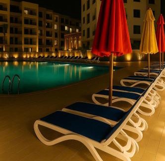 Al-Manasrah Ski Chalet | Beachfront Chalet in Porto Said with P Garden