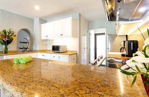 Centro Condo | Beachfront Retreat with Patio, BBQ Grill and Pools