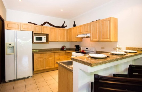 Playa Flamingo Condo | Beautiful Condo in Peaceful Cliffside Location with a Private Balcony & Stunning Ocean and Mountain Views