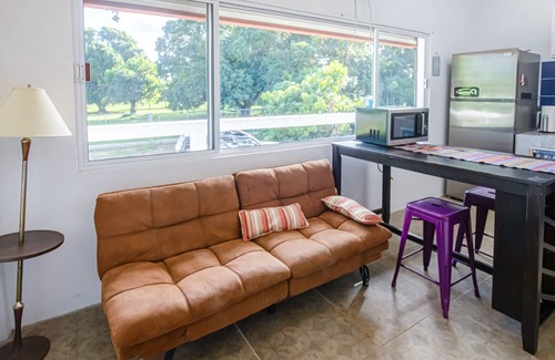 Dangriga Condo | Beautiful Condo with jungle views, splash pool partial AC & wifi