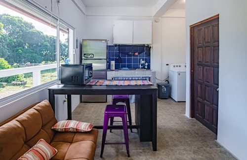 Dangriga Condo | Beautiful Condo with jungle views, splash pool partial AC & wifi