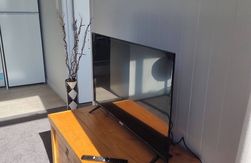 Clarks Beach Apartment | Beautiful harbour and rural farm views. Stunning views of sky tower and airport.