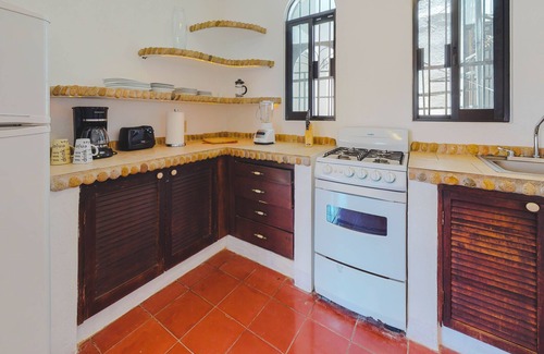 Proyecto escola Condo | Beautiful in town 3 Beds. 2 Bath one block from Malecon Casa de los Escritores 2