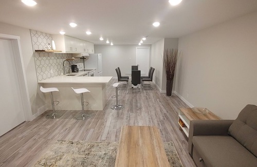 Southwest Calgary House | Beautiful two bedroom and an office lower level suit