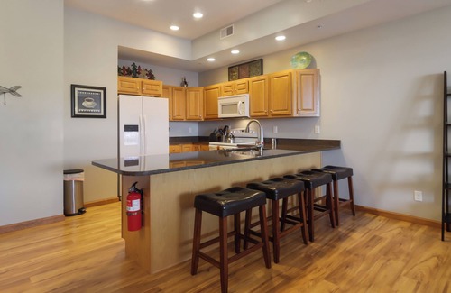 Frankfort Apartment | Betsie Harbor Lodging- Unit 1. Spacious apartment with access to Main Street