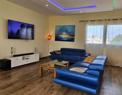 Lome Apartment | Blue sky