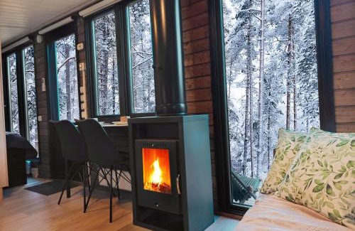 Muonio House | Borealis Village 3 with a Nature View, Fireplace, Sauna, Kitchen