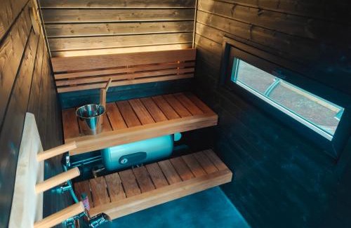 Muonio House | Borealis Village 3 with a Nature View, Fireplace, Sauna, Kitchen