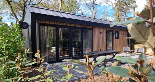 Nunspeet House | Boslodge Bosmus - 4 personen tussen de bomen