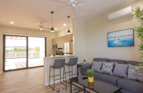 Leeward Settlement Apartment | Breezy Escape with Shared Pool & Easy Beach Access