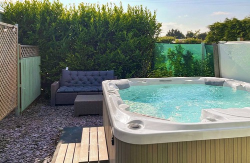 Chappel Cottage | Bright spacious with a lovely garden with hot tub.