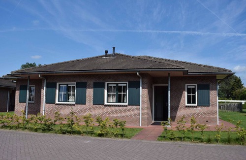 Voorthuizen House | Bungalow in Netherlands With Garden Terrace