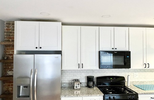 Downtown Baltimore Apartment | Butchers Hotel-Chef Suite with Stunning Roof Deck!