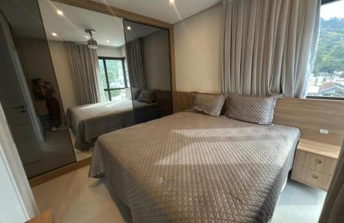 Governador Celso Ramos Apartment | Cód 57 - Apartamento 3 dormitórios NOVO a 180 metros do mar.