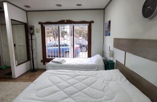 Punta Arenas Apartment | Cabaña de John Wine