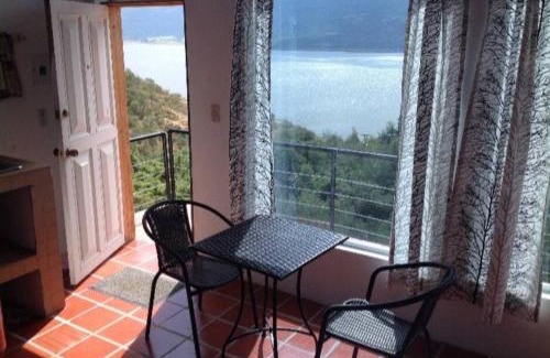 Guatavita House | Cabaña vista al lago Tominė y Naturaleza Guatavita