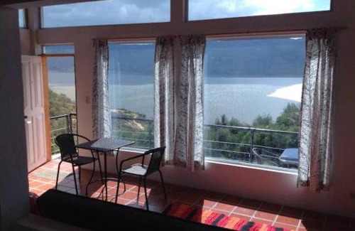 Guatavita House | Cabaña vista al lago Tominė y Naturaleza Guatavita