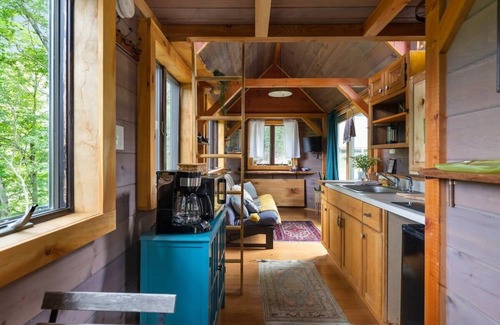 Johnson House | Caboose Tiny Home on river with hot tub near Stowe