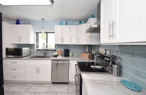 Palm Harbor House | Canal Front Pool Home in Palm Coast