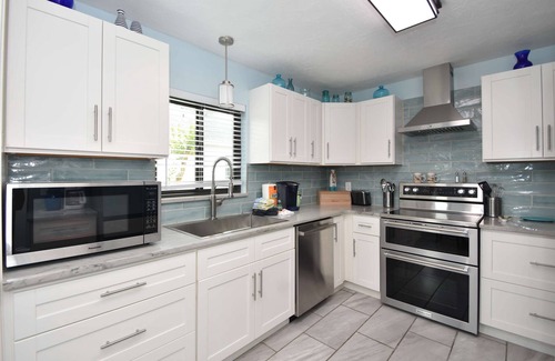 Palm Harbor House | Canal Front Pool Home in Palm Coast