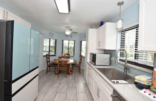 Palm Harbor House | Canal Front Pool Home in Palm Coast