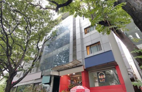 Jayanagar Hotel | Capital O Elegant Amethyst Business Hotel Near Ragigudda Sri Prasanna Anjaneyaswamy Temple