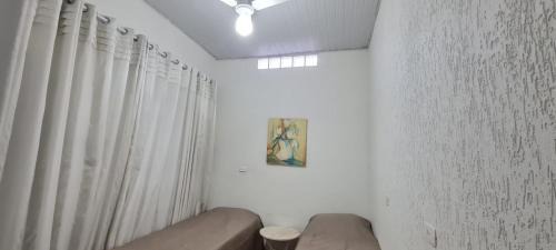 Monte Carmelo House | Casa a 1min do Espaço Cultural, com garagem coberta