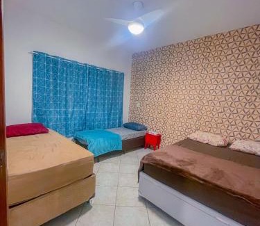 Aparecida House | Casa de Frente com Maria