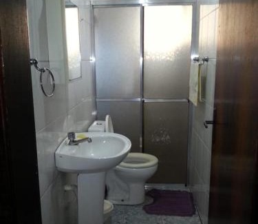 Jardim Britania House | Casa em Caraguá, uma quadra da praia com ar