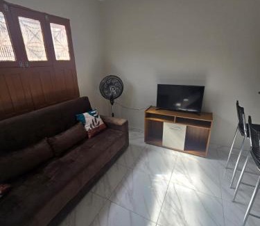 Cremacao House | Casa rosa - conforto com split, wifi e água quente