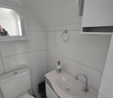 Cremacao House | Casa rosa - conforto com split, wifi e água quente